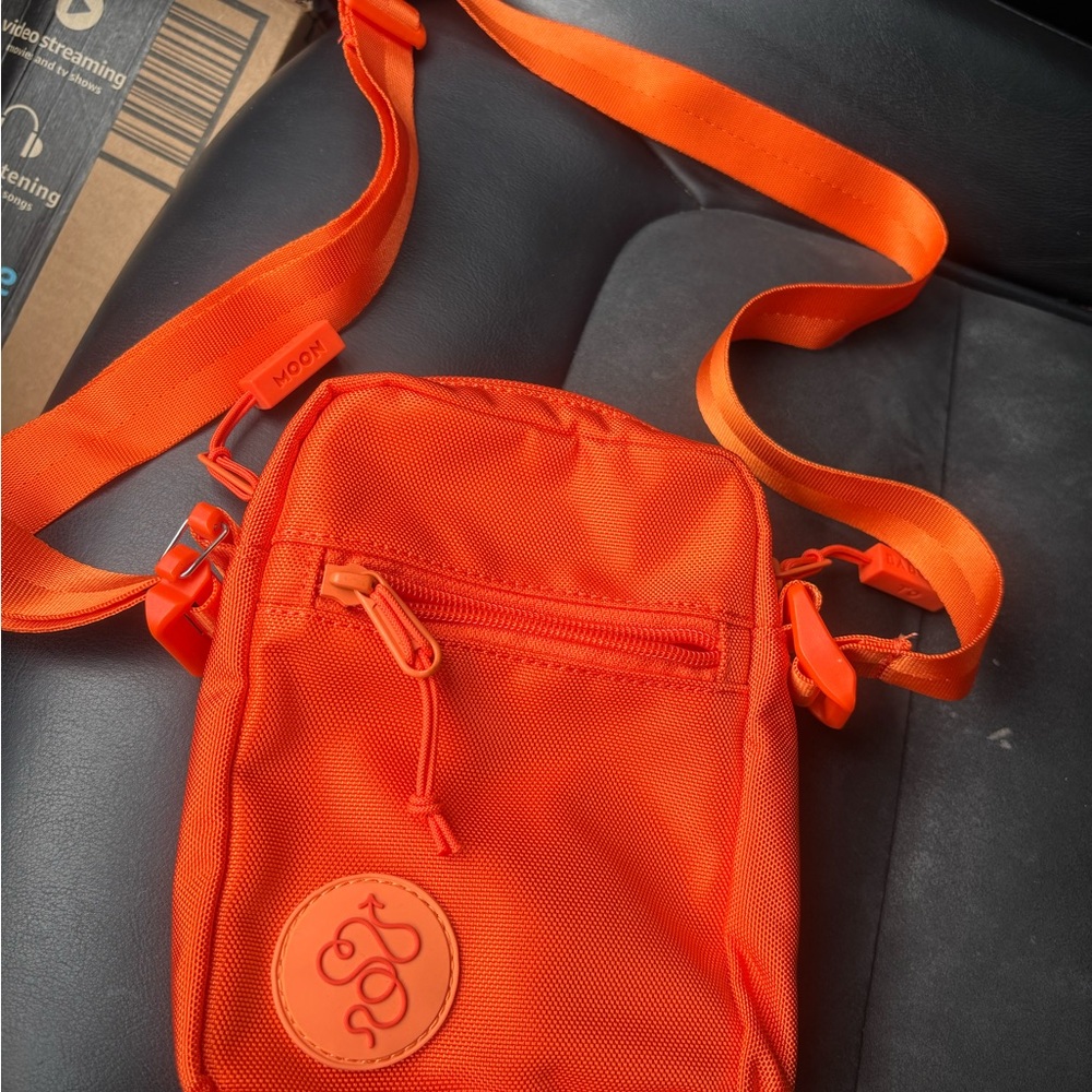 Baboon to the Moon orange crossbody.